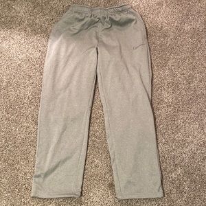 Large gray Nike sweatpants.